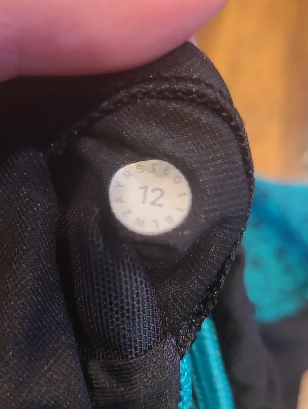 Lululemon Energy Bra in a black and teal 